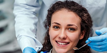 young woman attending dental checkup and cleaning in Allentown 