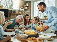 A family with 3 generations eating dinner together