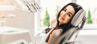 Smiling woman in dental chair