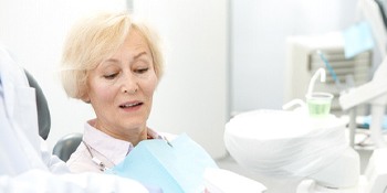 Senior woman and dentist