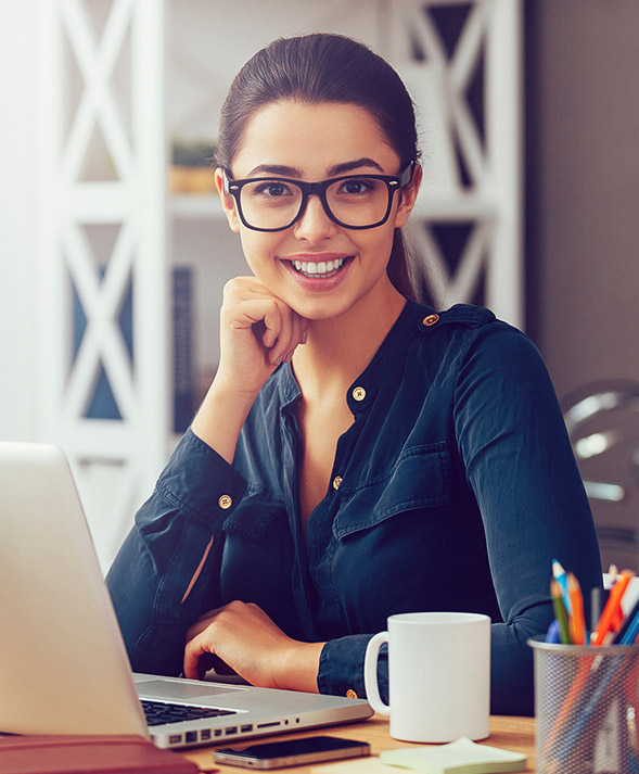 women in glasses smiling