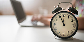 clock sitting on desk