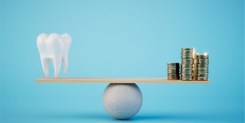 A 3D illustration of a tooth and gold coins on a balancing scale