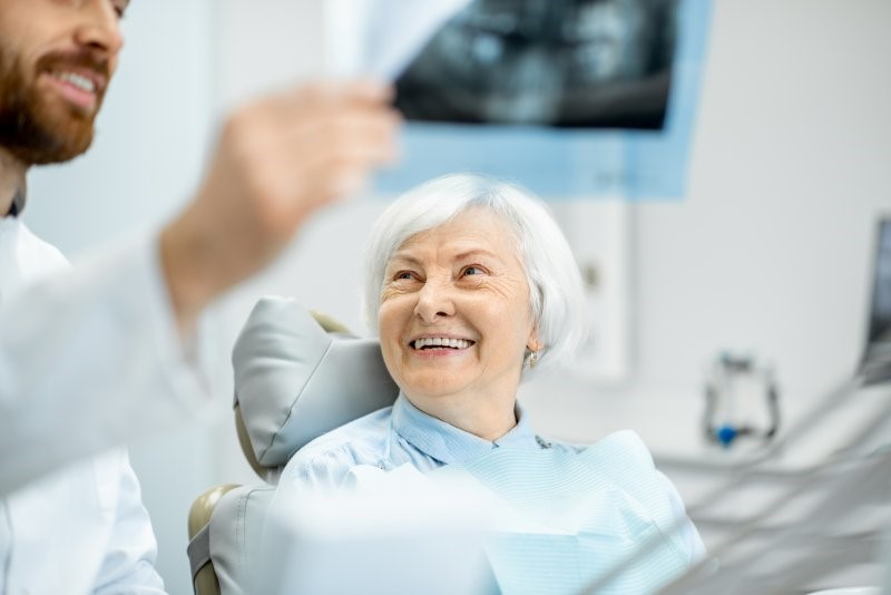 patient attending dental checkup with dentures